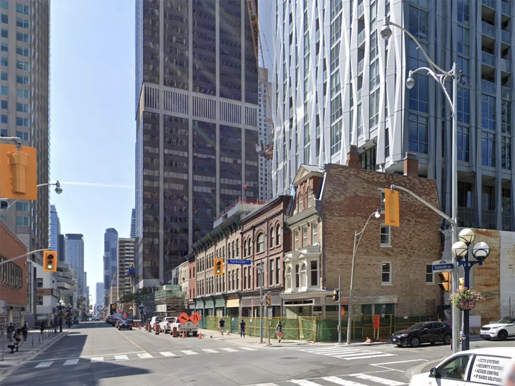 Step-backs at Yonge and Yorkville maintain human scale and heritage frontages.