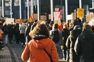 Crowd of protesters outside building