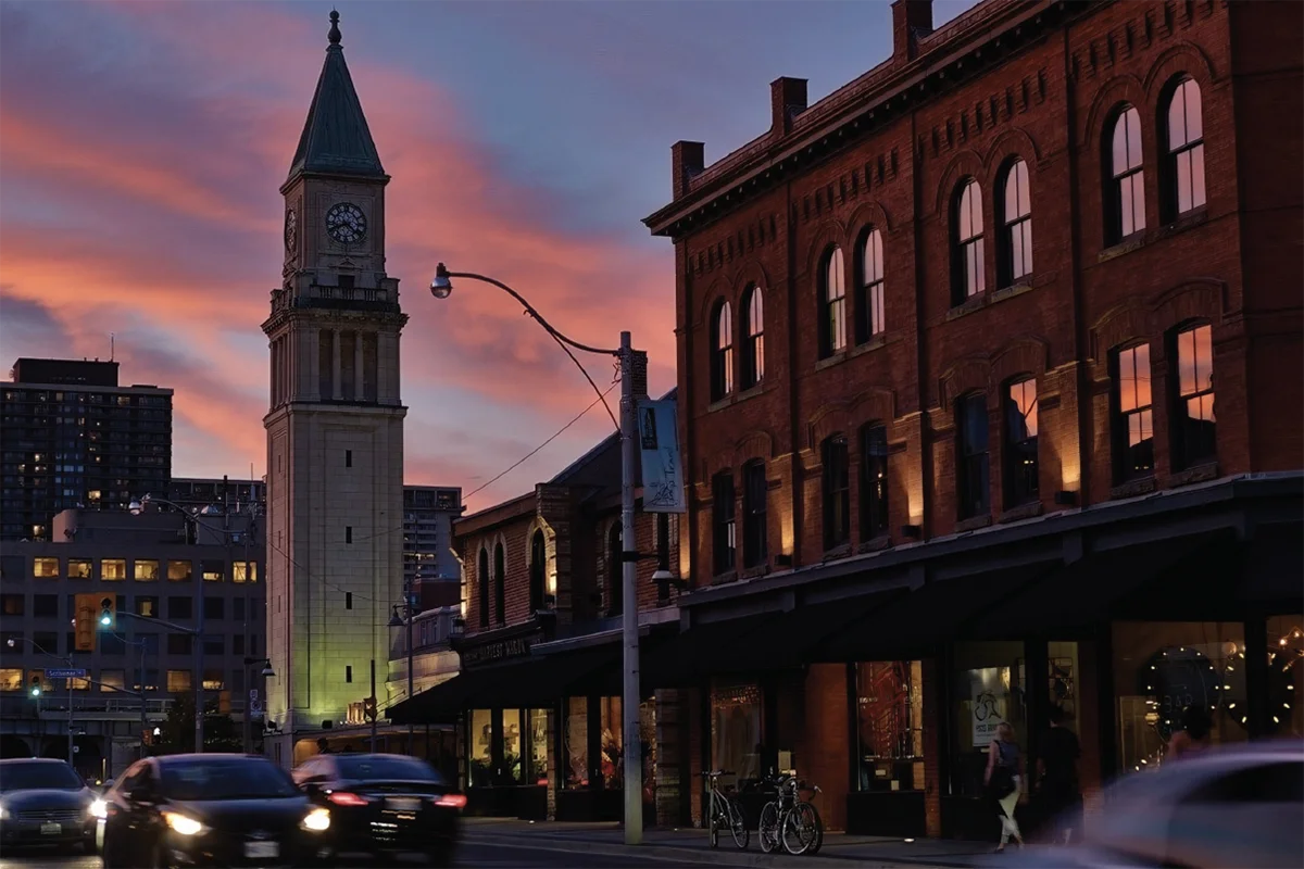 City skyline with clock tower at sunset